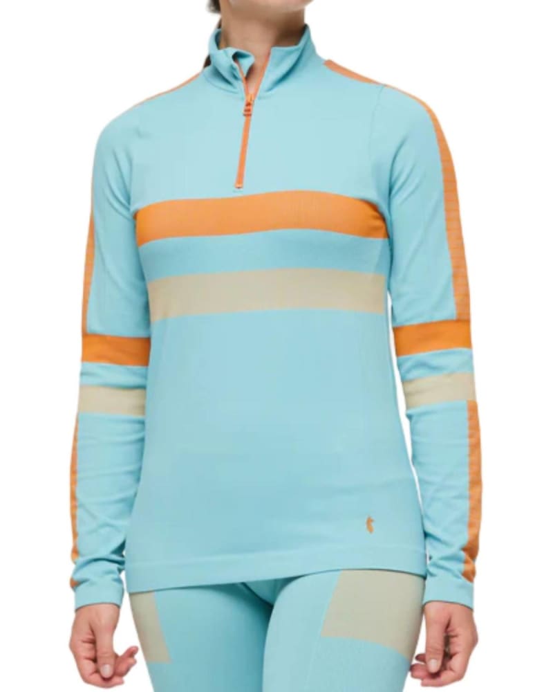 Front of a model wearing a size L Seamless Baselayer Quarter-Zip Top in Bluebird Stripes in Bluebird Stripes by cotopaxi. | dia_product_style_image_id:363075